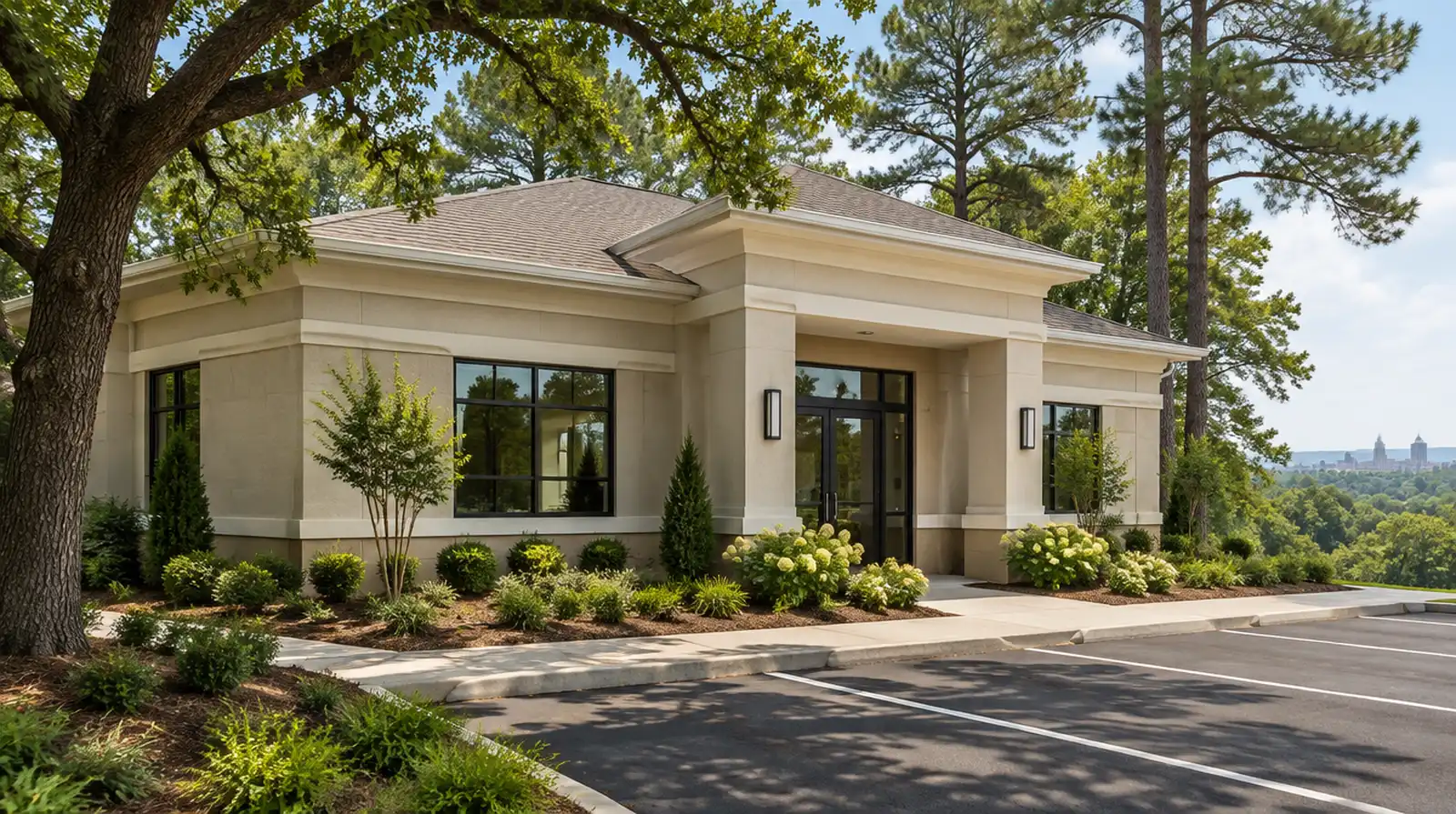 New small office building finished with sand-colored synthetic stucco and decorative bands